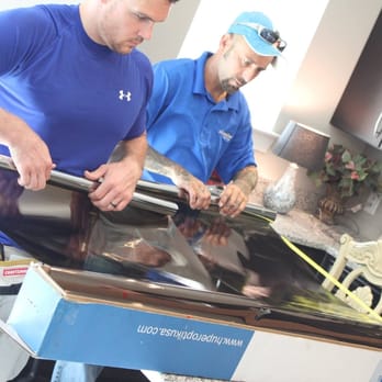 AAA Window Cleaning - Installing Huper Optik window tinting. - Window Washing Near Me - Fort Mill, South Carolina AAA Window Cleaning - Installing Huper Optik window tinting. - Window Washing Near Me - Fort Mill, South Carolina
