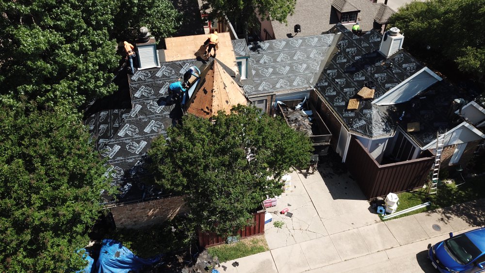 Slide of Triton Roofing & Restoration