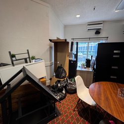 Popo's Junk Removal - Cluttered office space