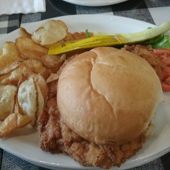 Farmhouse Restaurant - Pork tenderloin sandwich with homemade chips - American Near Me - Branson, Missouri Farmhouse Restaurant - Pork tenderloin sandwich with homemade chips - American Near Me - Branson, Missouri
