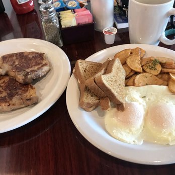 Shelly's Cafe - Pork Chop breakfast...plus home fries (I'm watching my figure). - Breakfast & Brunch Near Me - Tampa, Florida Shelly's Cafe - Pork Chop breakfast...plus home fries (I'm watching my figure). - Breakfast & Brunch Near Me - Tampa, Florida