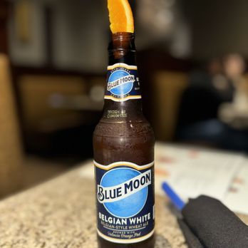 The Melting Pot - a bottle of blue moon - Fondue Near Me - Roswell, Georgia The Melting Pot - a bottle of blue moon - Fondue Near Me - Roswell, Georgia