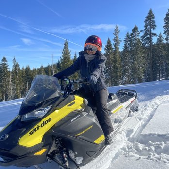 Cold stream Adventures - Our guide let me take a photo with his snowmobile - Tours Near Me - Truckee, California