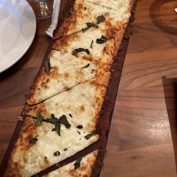 Seasons 52 - Mozzarella flat bread with no tomatoes - New American Near Me - Altamonte Springs, Florida Seasons 52 - Mozzarella flat bread with no tomatoes - New American Near Me - Altamonte Springs, Florida