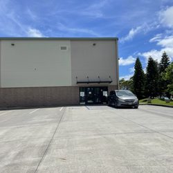 Kokua Korner Mart - From the outside. It's the corner of a warehouse.