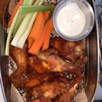Topgolf - TOPGOLF WINGS ($11.5): Boneless or bone-in, tossed in your choice of: Mango Habanero (1,090 CAL.) - New American Near Me - Edison, New Jersey Topgolf - TOPGOLF WINGS ($11.5): Boneless or bone-in, tossed in your choice of: Mango Habanero (1,090 CAL.) - New American Near Me - Edison, New Jersey