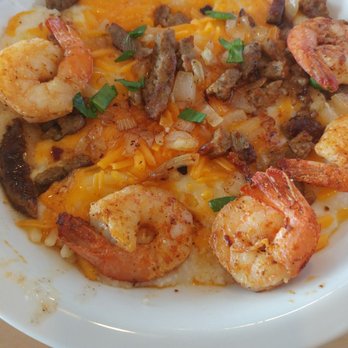 Huskers Cafe - "Make Your Own" bowl with shrimp, creamy grits, Jack and cheddar cheeses, sausage bits, and onions. SOO YUMMY - Breakfast & Brunch Near Me - Stone Mountain, Georgia Huskers Cafe - "Make Your Own" bowl with shrimp, creamy grits, Jack and cheddar cheeses, sausage bits, and onions. SOO YUMMY - Breakfast & Brunch Near Me - Stone Mountain, Georgia