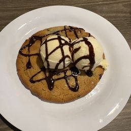 Warm chocolate chip cookie with ice cream Warm chocolate chip cookie with ice cream