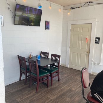 Taqueria EL Exito - a dining room with a flat screen tv - Mexican Near Me - Dover, Ohio Taqueria EL Exito - a dining room with a flat screen tv - Mexican Near Me - Dover, Ohio