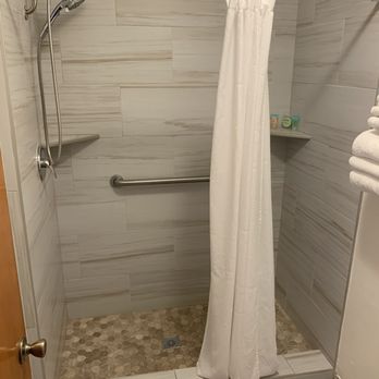 Solvang Inn & Cottages - Step-in Tiled Shower with Good Water Pressure - Hotels Near Me - Solvang, California Solvang Inn & Cottages - Step-in Tiled Shower with Good Water Pressure - Hotels Near Me - Solvang, California