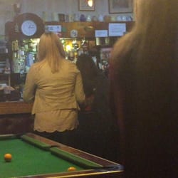 Castlebay Bar - It is hard to tell, but that clock counts down backwards and really messes with you a few drinks deep!