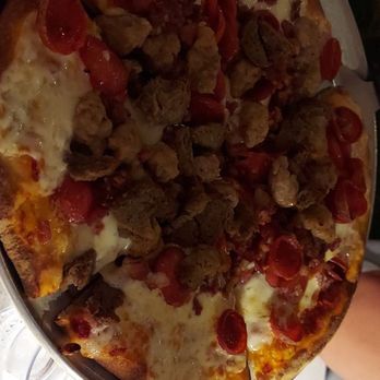 Crooked Palm Cabana - Meat lovers pizza - Cocktail Bars Near Me - Tavernier, Florida