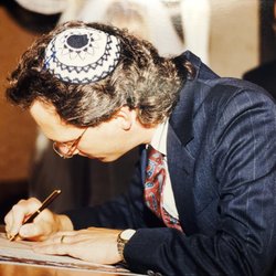 Temple Emanuel of Tempe - Rabbi Andrew Straus signs a Marriage License and Ketubah during a wedding ceremony at Temple Emanuel in May, 1999.