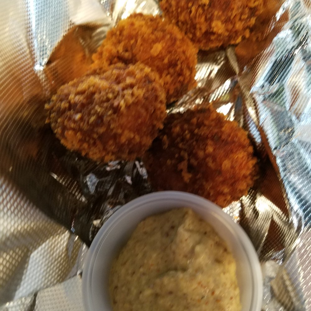 The Saint Shack - crispy boudin balls with spicy brown mustard. Crispy on the outside but soft and tender inside. - Cocktail Bars Near Me - Indianapolis, Indiana The Saint Shack - crispy boudin balls with spicy brown mustard. Crispy on the outside but soft and tender inside. - Cocktail Bars Near Me - Indianapolis, Indiana