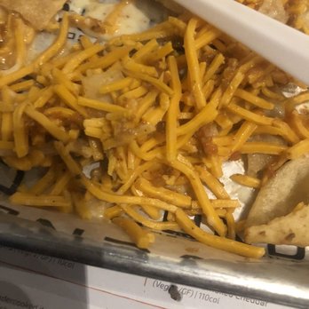 Condado Tacos - This was supposed to be "Steak Nachos".  Good luck finding the steak.  As you will see the cheese isn't even melted a bit. - Mexican Near Me - Lexington, Kentucky