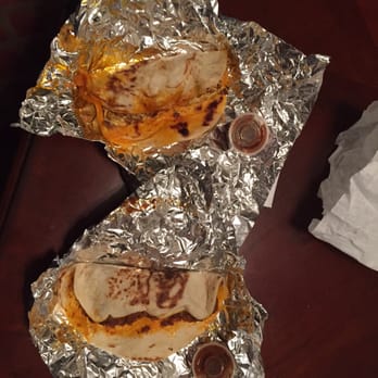 Taqueria El Tapatio - two quesadillas wrapped in foil - Mexican Near Me - Portland, Texas Taqueria El Tapatio - two quesadillas wrapped in foil - Mexican Near Me - Portland, Texas