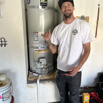 Lorette Plumbing & Drains - He even humored me by letting me take a photo of him and our new hot water heater. - Plumbing Near Me Lorette Plumbing & Drains - He even humored me by letting me take a photo of him and our new hot water heater. - Plumbing Near Me