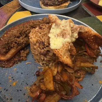 Mahari - Spiced beef, suya mushrooms, stuffed plained with burnt feta - African Near Me - Chicago, Illinois