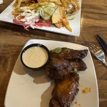 Downtown Flavortown - Wings you get 7 to an order! And the hot chicken nachos. - Arcades Near Me - Pigeon Forge, Tennessee Downtown Flavortown - Wings you get 7 to an order! And the hot chicken nachos. - Arcades Near Me - Pigeon Forge, Tennessee