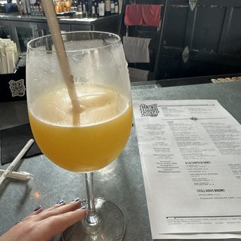 Black Sheep - Half filled mimosa - Wine Bars Near Me - Milwaukee, Wisconsin Black Sheep - Half filled mimosa - Wine Bars Near Me - Milwaukee, Wisconsin