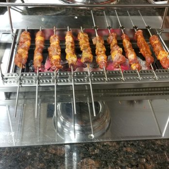 Meng Gao Yang BBQ - Self cooking the order of lamb, rotates meat. - Chinese Near Me - Edison, New Jersey