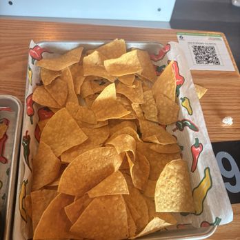 GuacoTaco Elevated Fresh Mex - All leftover chips from queso and salsa set - Tacos Near Me - Ballwin, Missouri GuacoTaco Elevated Fresh Mex - All leftover chips from queso and salsa set - Tacos Near Me - Ballwin, Missouri