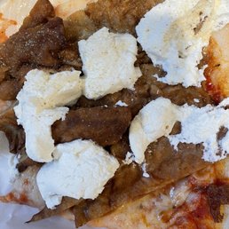 Sorry looking eggplant slice for $5. They don't cook the ricotta into the slice Sorry looking eggplant slice for $5. They don't cook the ricotta into the slice