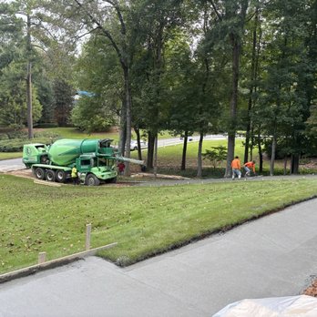 Arbor Hills Construction - Here the fiberous cement truck pulls up the driveway to pour the concrete - Masonry/Concrete Near Me Arbor Hills Construction - Here the fiberous cement truck pulls up the driveway to pour the concrete - Masonry/Concrete Near Me