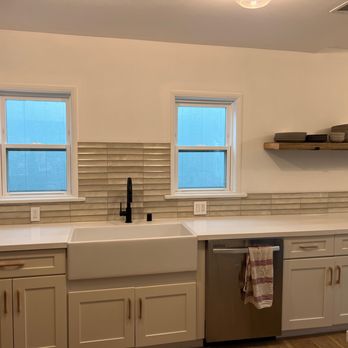 LA Custom Tile - a kitchen with a sink and dishwasher - General Contractors Near Me - Los Angeles, California