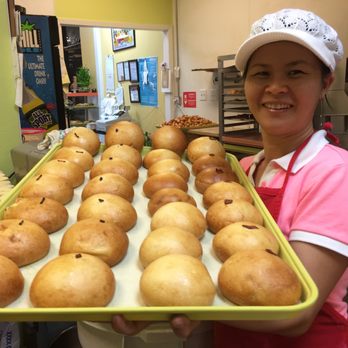 Mr Donut and Kolache - a woman holding a tray of donuts - Donuts Near Me - Katy, Texas Mr Donut and Kolache - a woman holding a tray of donuts - Donuts Near Me - Katy, Texas