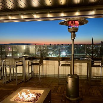 Elderwood - Catch a sunset with your dinner from the cozy yet expansive rooftop dining area - Cocktail Bars Near Me - Visalia, California Elderwood - Catch a sunset with your dinner from the cozy yet expansive rooftop dining area - Cocktail Bars Near Me - Visalia, California