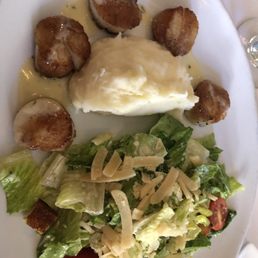 Scallops, mashed potatoes, and Caesar salad