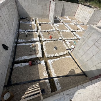 The Basement Kings - Drainage system by The Basement Kings to help seal a basement in Texas's 4000 sqft basement. - General Contractors Near Me - Fairview, Texas