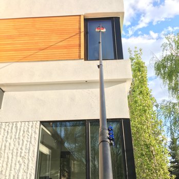 Pure Wash Calgary - Using our water-fed pole system in Elbow Park - Window Washing Near Me Pure Wash Calgary - Using our water-fed pole system in Elbow Park - Window Washing Near Me