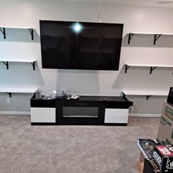 Miller Electric and Remodeling - Installed TV, Shelves, fireplace, and picture