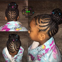Pretty Itty Bitties - Braided bun with hair clips. No hair added.