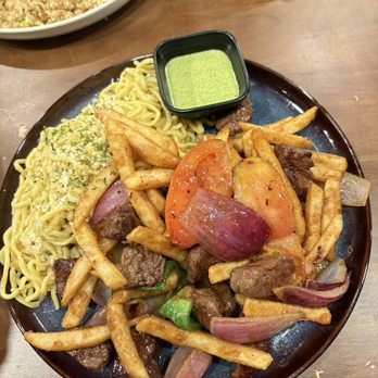 Sona Fusion Kitchen - LOMO SALTADO (BEEF) with GARLIC NOODLES - Asian Fusion Near Me - Anaheim, California Sona Fusion Kitchen - LOMO SALTADO (BEEF) with GARLIC NOODLES - Asian Fusion Near Me - Anaheim, California