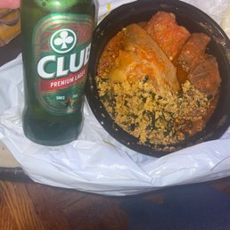 Mixed Meat stew, Egusi and fufu. Washed down with a Ghanaian beer named Club.