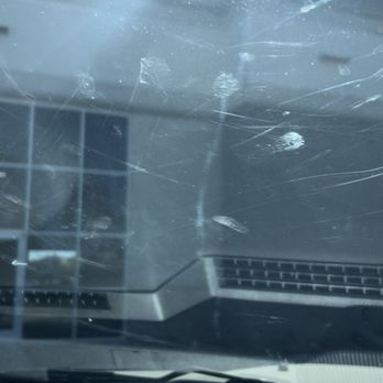 The Tint Vault - Handprint with scratches - Car Window Tinting Near Me