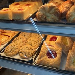 Food Universe Marketplace - Look good. access to the back blocked by racks of bread.