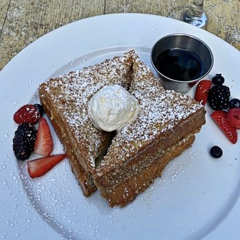 Driftwood Kitchen - French Toast - possibly the best I've ever had. Crusted with granola and topped with caramelized hazelnut butter!! YUM - Seafood Near Me - Laguna Beach, California