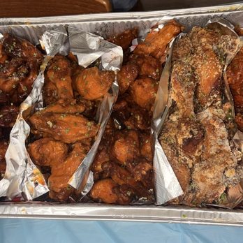 Wing Castle - Left to right: honey bbq, hot, mango habanero, spicy garlic Parmesan, spicy lemon pepper - Chicken Wings Near Me - Lewisville, Texas Wing Castle - Left to right: honey bbq, hot, mango habanero, spicy garlic Parmesan, spicy lemon pepper - Chicken Wings Near Me - Lewisville, Texas