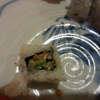 Sushi Cafe - Piece of salmon skin roll. I see the cucumber but where is the salmon skin? - Sushi Bars Near Me - West Caldwell, New Jersey Sushi Cafe - Piece of salmon skin roll. I see the cucumber but where is the salmon skin? - Sushi Bars Near Me - West Caldwell, New Jersey