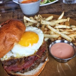 Dry aged burger with sopressto, carmalized onion, fried egg with bourbon sauce