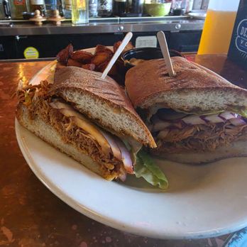 Cha Cha Cha - Spicy chicken sandwich with potatoes - Caribbean Near Me - San Francisco, California Cha Cha Cha - Spicy chicken sandwich with potatoes - Caribbean Near Me - San Francisco, California