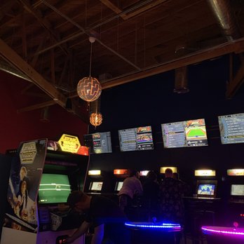 Player One - Some of the games along the wall in the back room. - Lounges Near Me - North Hollywood, California Player One - Some of the games along the wall in the back room. - Lounges Near Me - North Hollywood, California