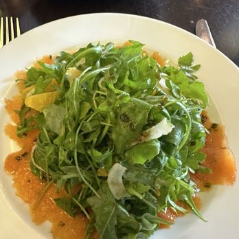 Il Piatto - Il Piatto salad.  No salmon as I had requested.  But look at all that smoked salmon layering and filling the bottom of the plate. Too much! - Italian Near Me - Washington, DC, District of Columbia