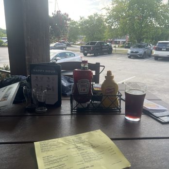 The Pour House - Just a table bein a table - American Near Me - Exton, Pennsylvania The Pour House - Just a table bein a table - American Near Me - Exton, Pennsylvania