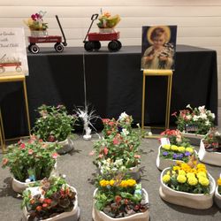 Regovich's Catered Services - flowers near basket raffle to make money for children of Lake County
