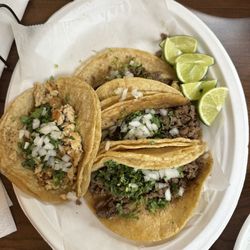 El Angel Carniceria & Taqueria - Steak Taco Corn Tortilla and one pork Taco Corn Tortilla